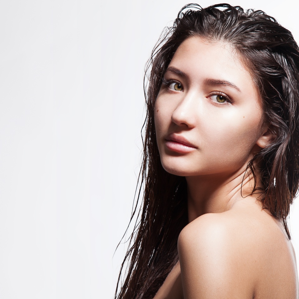 Girl without a make-up with a clear perfect skin and beautiful eyes